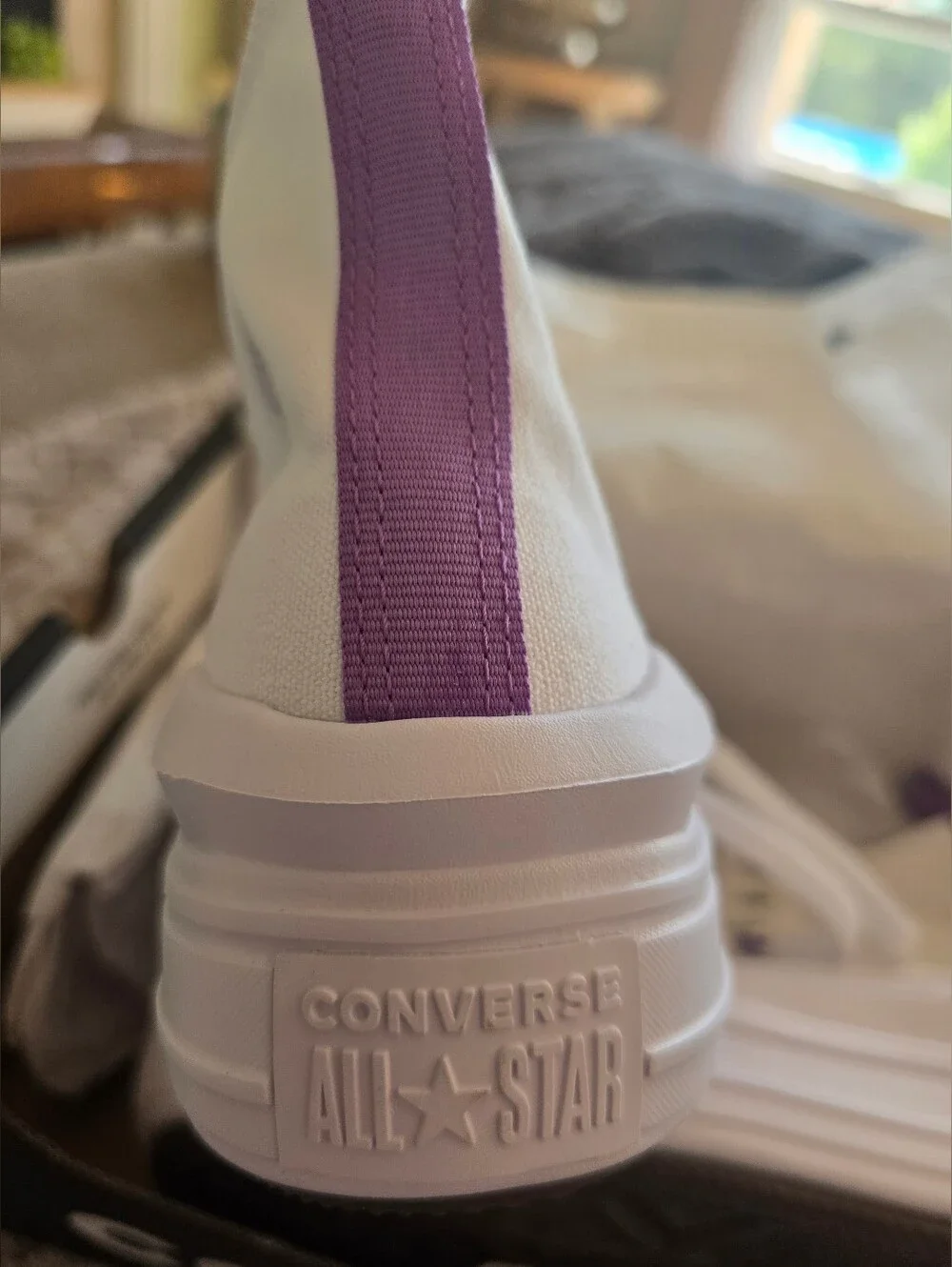 Converse White High-Top Platform Sneakers with Purple Star Logo